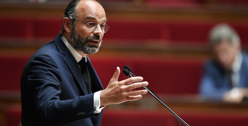 French Prime Minister Edouard Philippe presents his plan to exit from the lockdown at the National Assembly in Paris, Tuesday, April 28, 2020. French Prime Minister Edouard Philippe has outlined a stringent plan to fight coronavirus in France by automatically testing everyone who\'s come in contact with someone infected with COVID-19. (David Niviere, Pool via AP)
